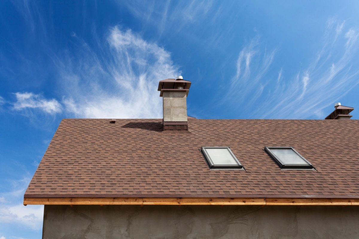 house roof with skylights against sky