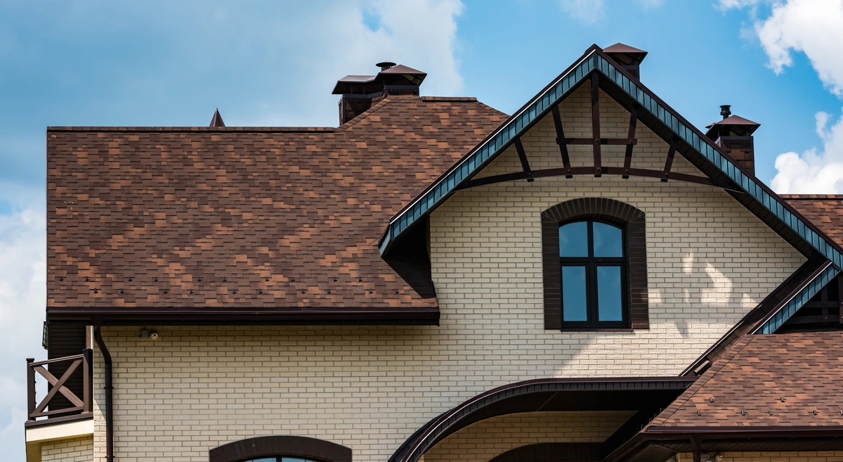 brown architectural shingles on the house roof