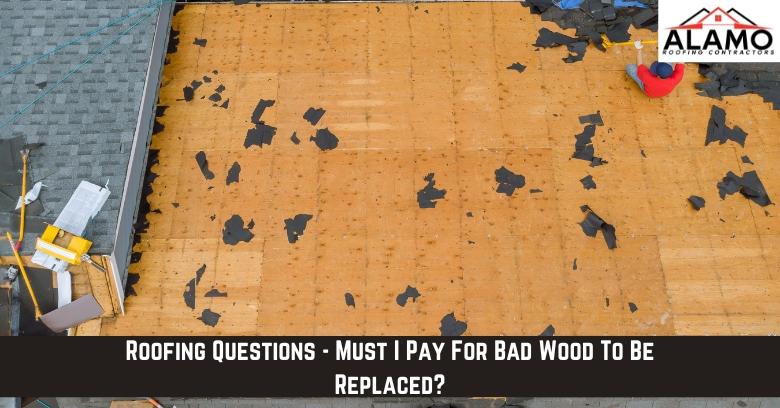 Partially stripped roof showing exposed plywood and scattered roofing debris, with tools nearby and a company logo in the top right corner. Partially stripped roof showing exposed plywood and scattered roofing debris, with tools nearby and a company logo in the top right corner.