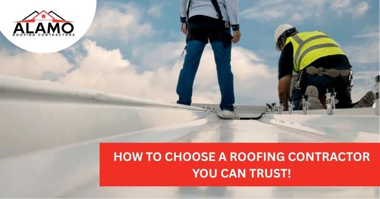 Two workers in safety gear inspect a rooftop under a cloudy sky, with a banner reading How to choose a roofing contractor you can trust! and the Alamo Roofing Contractors logo. Two workers in safety gear inspect a rooftop under a cloudy sky, with a banner reading How to choose a roofing contractor you can trust! and the Alamo Roofing Contractors logo.